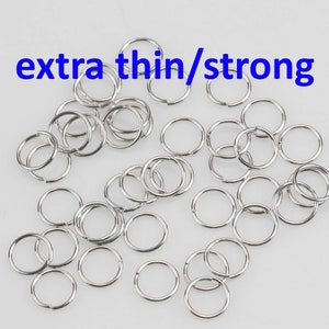 White Gold Silver Toned SUPER STRONG/ Extra THIN Jump Rings 3mm 4mm 5mm. Carbon Steel - Very sturdy despite thickness.