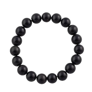 Könnte beinhalten: Ein schwarzes Perlenarmband mit runden Perlen.
