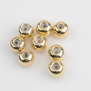 Small Rubber Stopper Gold Beads