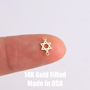 May include: A gold-filled Star of David charm with two jump rings. 14K Gold Filled Made in USA.