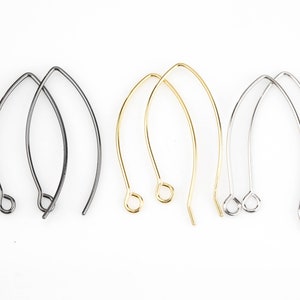 May include: Three pairs of earring hooks in different finishes: silver, gold, and black.