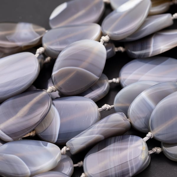 Natural Botswana Agate Twisted Oval Beads Approximately 21x31mm High Quality Full Strand 15.5 Inch Long AAA Quality Smooth Gemstone Beads