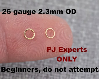 May include: Two gold 26 gauge 2.3mm OD seamless rings on a finger.  PJ Experts ONLY. Beginners, do not attempt.
