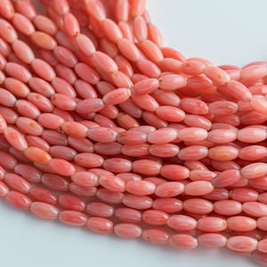 オレンジ竹珊瑚樽型ビーズ - 3 x 6 mm。15.5インチの高品質ストランド