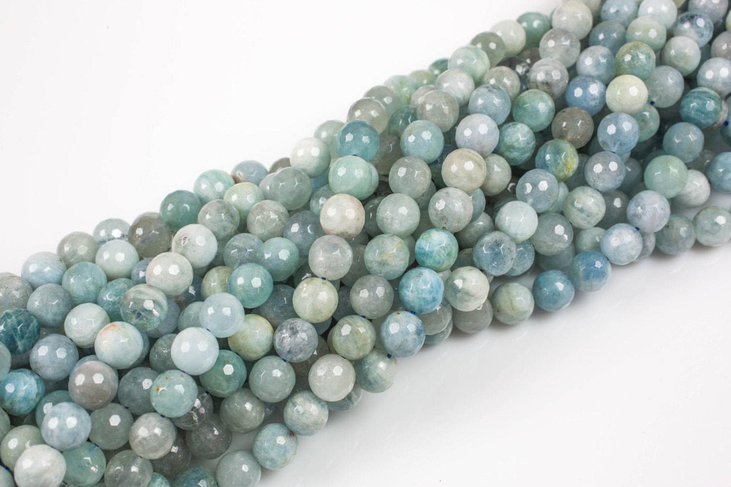 Natural aquamarine faceted round beads in full strands.  6mm, 8mm, 10mm, 12mm, 14mm - Full Strand 15.5 inch Strand - Grade A
