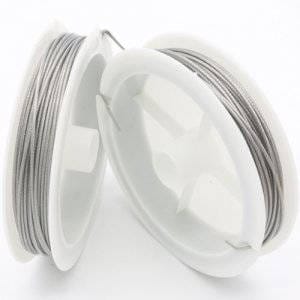 May include: Two spools of silver-colored wire for jewelry making. The wire is wound around a white plastic spool with a clear plastic center.
