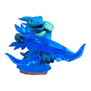 May include: A blue action figure of a dragon-like creature holding a translucent blue bow and arrow. The figure has green eyes, gold shoulder armor, and a red base. The bow is a prominent feature, with a curved design.