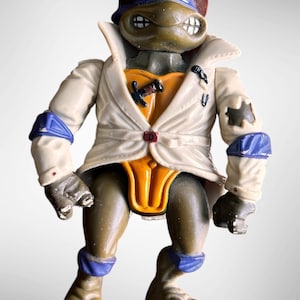 Vintage TMNT Donatello Don the Undercover Turtle 1990 Playmates Figure