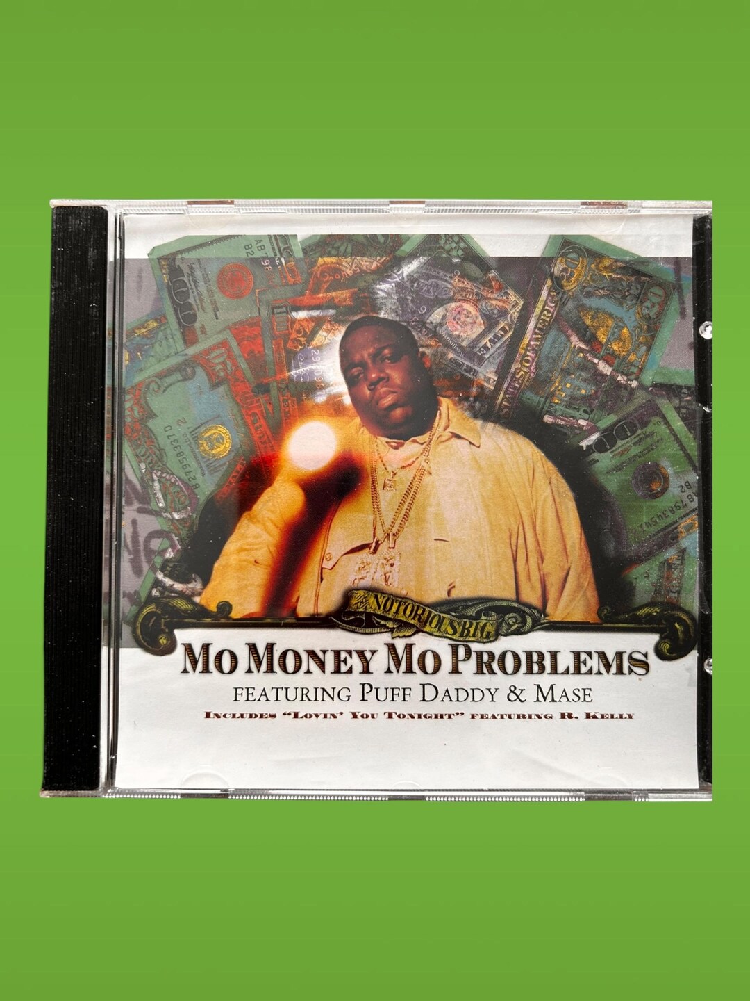The Notorious B.I.G. Featuring Puff Daddy and Mase – Mo Money Mo