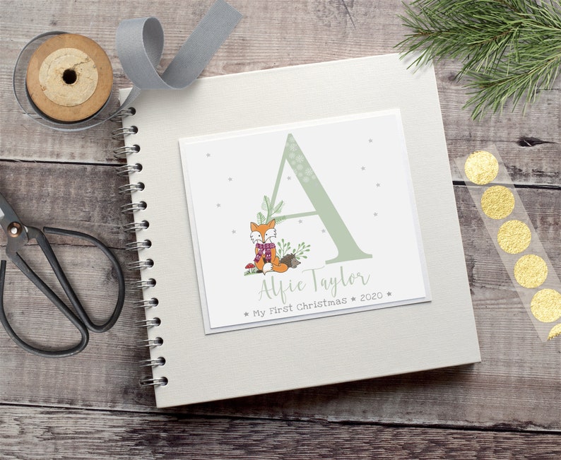 personalised first christmas book
