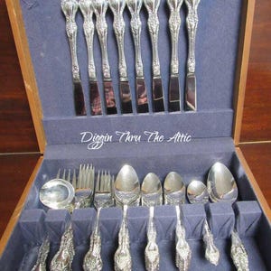 ESI10 Silverplate by Estia, Made in Korea,Flower and Scroll Pattern, Silverware, Flatware, Service for 8, 55 pieces.    (3865)