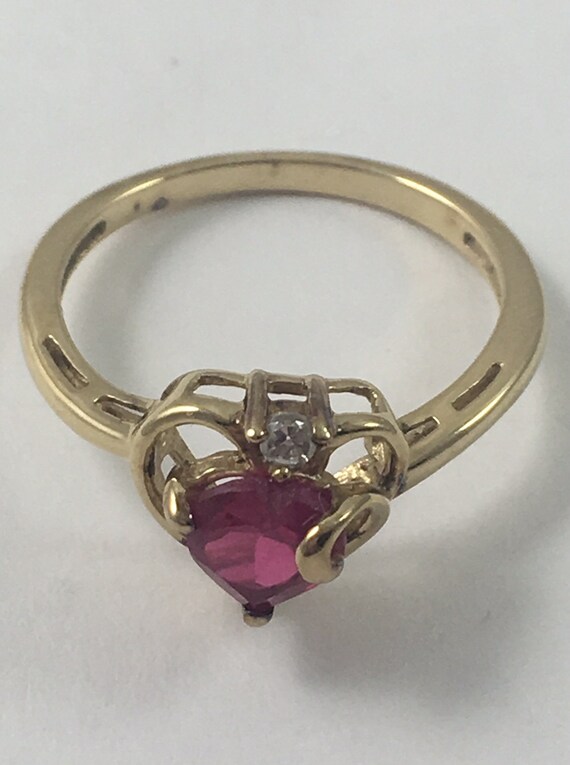 Ruby Red Grade CZ Surrounded by Stunning Heart in… - image 1