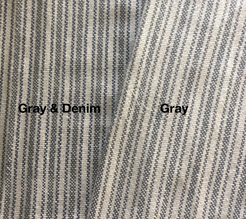 May include: Close-up of two fabric swatches with a striped pattern. The swatch on the left is labeled "Gray & Denim" and the swatch on the right is labeled "Gray".