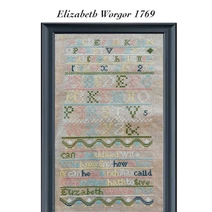 Puede incluir: Un sampler de punto de cruz enmarcado con el texto "Elizabeth Worgor 1769" y la cita "can be a drudged wife I know not how or can he be a rich man called Elizabeth hath to give".