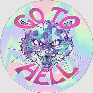 May include: A holographic sticker with a pink and blue background featuring a cartoon cat with a menacing expression. The cat is surrounded by the text "GO TO HELL" in pink.