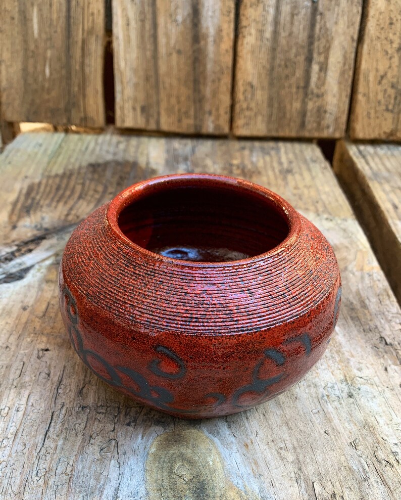 Modern red and black accent vase