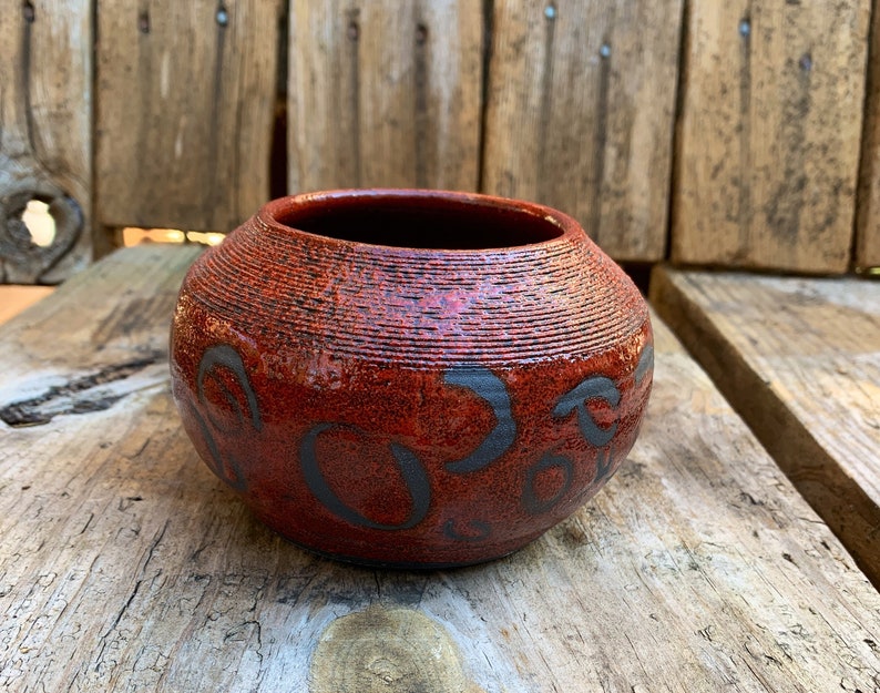 Modern red and black accent vase