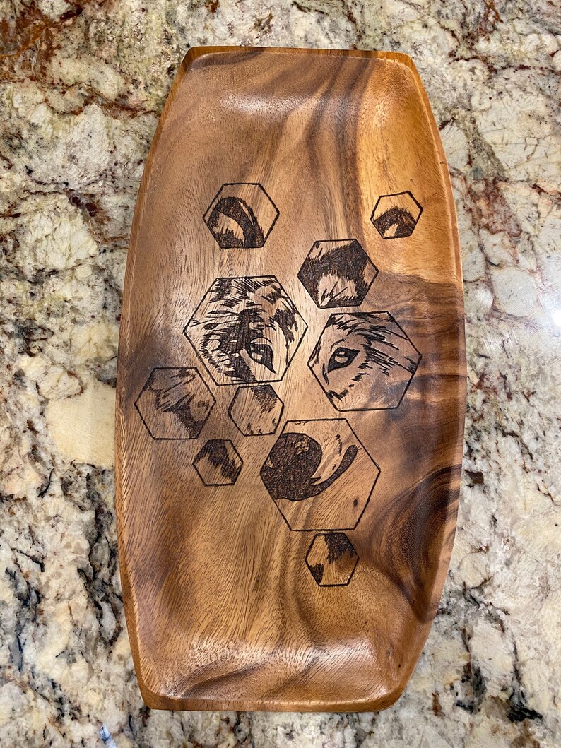 Gorgeous wooden platter wood burned with hexagons and a wolf