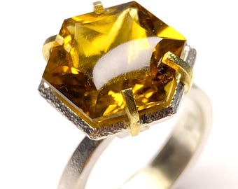 Beautiful and large ring with precious natural Citrine from Brazil with 18K gold and Sterling Silver claws. Ring.