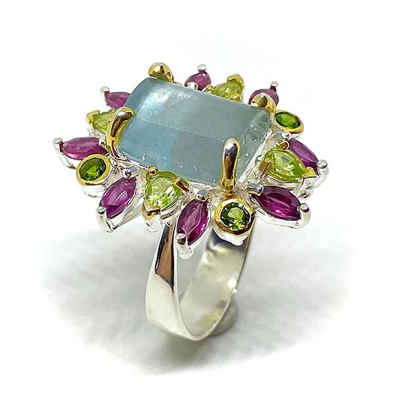 Belle bague avec une belle Aigue marine centrale de 12 mm x 9 mm avec des Peridots des Diopsides et des Grenats Rhodolite. Anneau. Etsy France