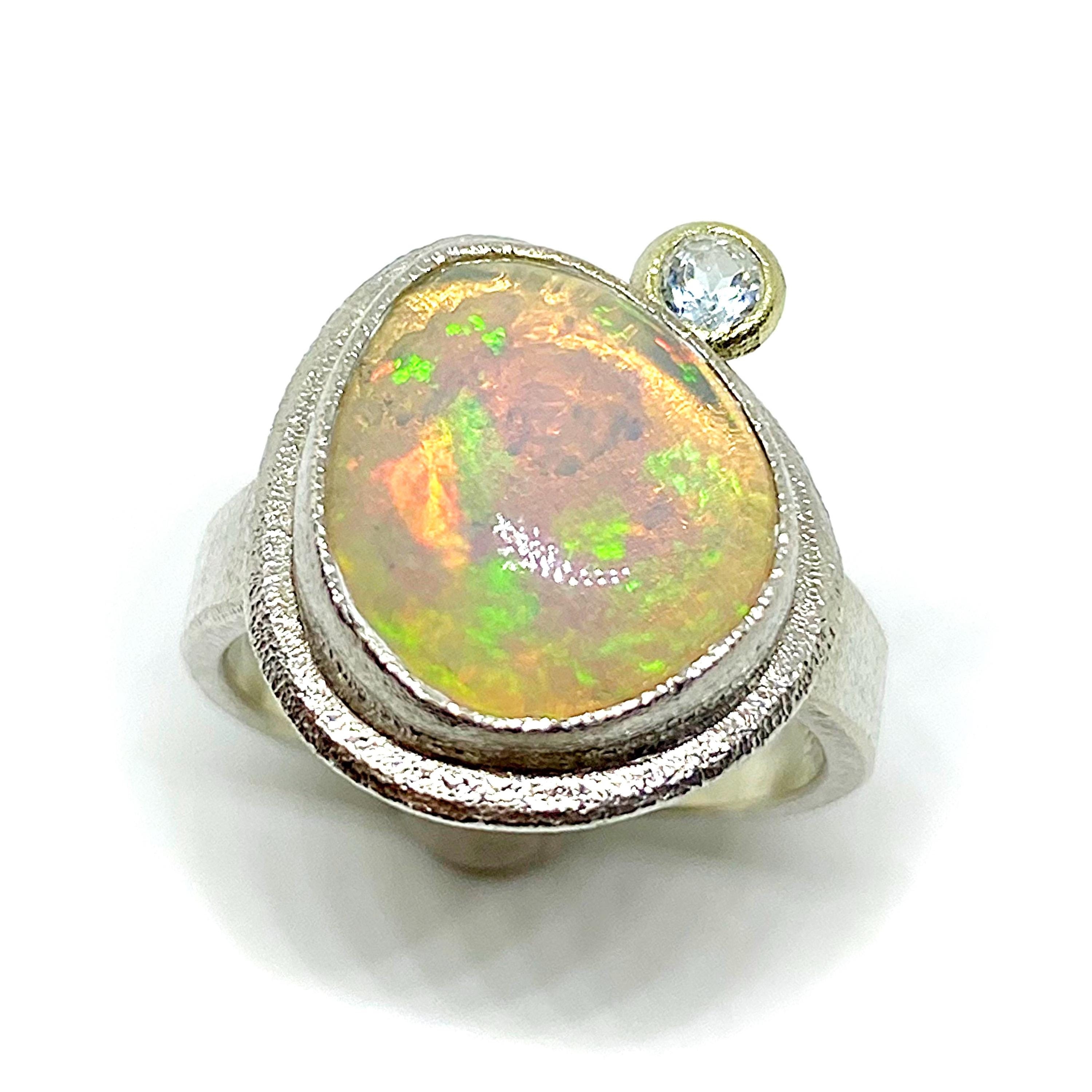 Awesome exclusive sterling silver and 14K Gold ring with oval shape 15 mm x 13 mm (5.49 carats) white multicoloured Opal stone. Ring.