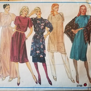 May include: A vintage sewing pattern for Vogue's Basic Design, featuring five different dress styles. The pattern number is 2798.