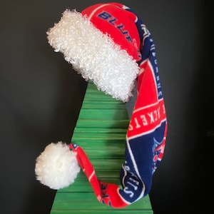 NHL Columbus Blue Jackets block print fleece with white furry fleece trim and 3 inch pom pom