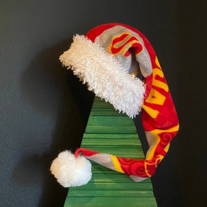 USC (University of Southern California) block print fleece with white furry fleece trim and 3 inch Pom Pom