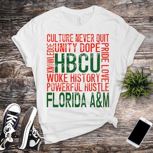 May include: White t-shirt with green and red text that reads "Culture Never Quit, Unity Dope, Pride Love, HBCU, Woke History, Powerful Hustle, Florida A&M".