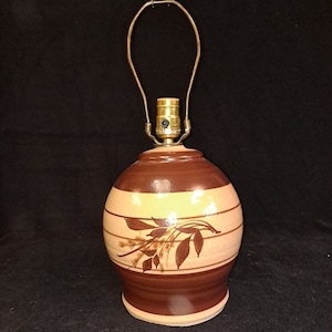 VTG  Earthenware Lamp from the 1970s , soothing Brown and tan tones stylized wheat motif. 12 inch to top of socket 8 inches wide . rewired.
