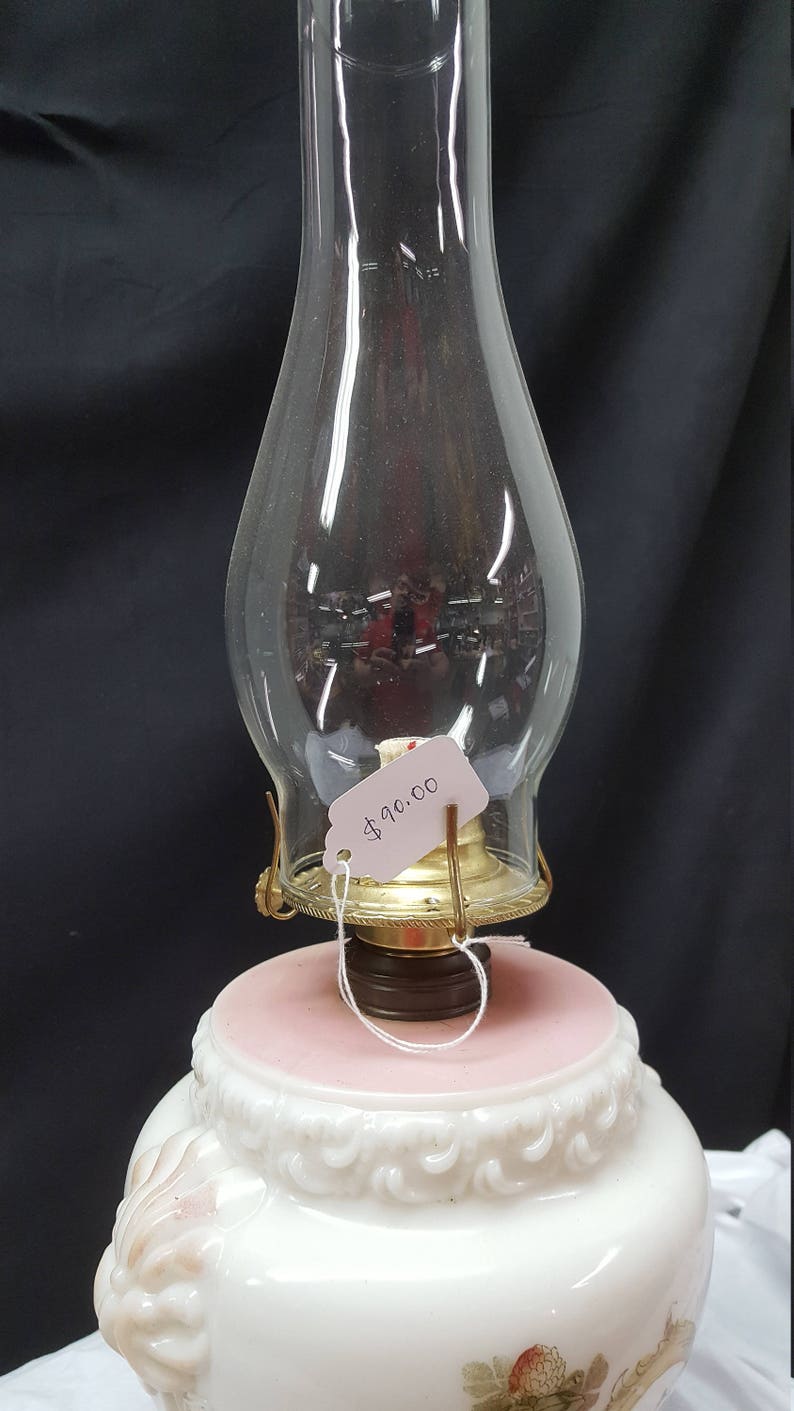 antique oil lamp with applied decoration iron stand hurricane lamp Molded Milk glass oil font Consolidated Glass Company pink
