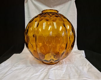 Large 12 inch  dark amber colored glass  Ball shaped swag lamp body melon ribbed  optic dot  4 inch fitter  and 3 3/4 inch fitter. ncc