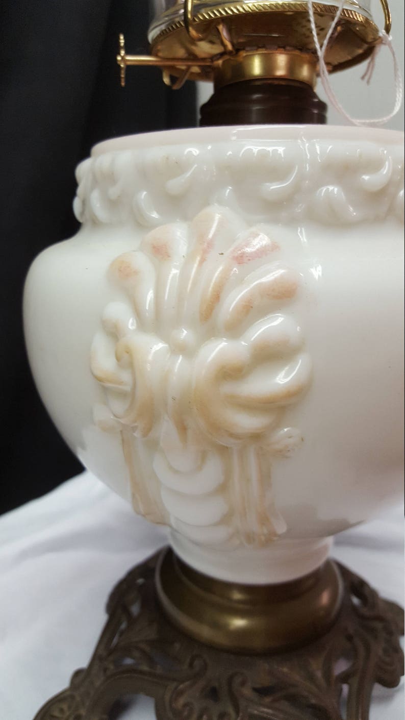 antique oil lamp with applied decoration iron stand hurricane lamp Molded Milk glass oil font Consolidated Glass Company pink