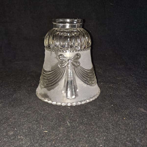 Vintage  decorative  bell shaped  frost and clear  pressed glass  light shade or bulb cover 2 1/4 in fitter  embossed bows and garland , ncc