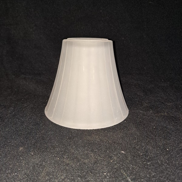 Frosted white  neckless bell shaped  lighting globe  , ribbed pattern  1 5/8  center hole ,  mounts with retaining ring . 4 1/2 inch tall nc