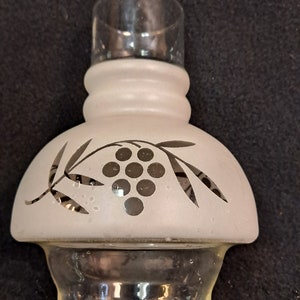 Frosted  Clear Glass  with  stenciled , Grape Bunches motif ,  7 inches tall , 5 inches wide , 3 inch fitter . no chips or cracks , retro