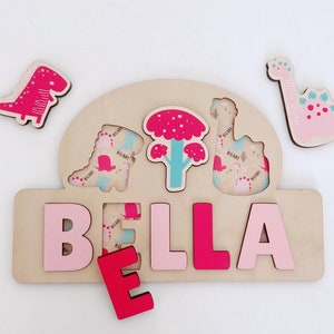 Rompecabezas de nombre de madera, rompecabezas de dinosaurio, juguetes de madera personalizados, regalo de primer cumpleaños de niña rosa, aprendizaje Montessori