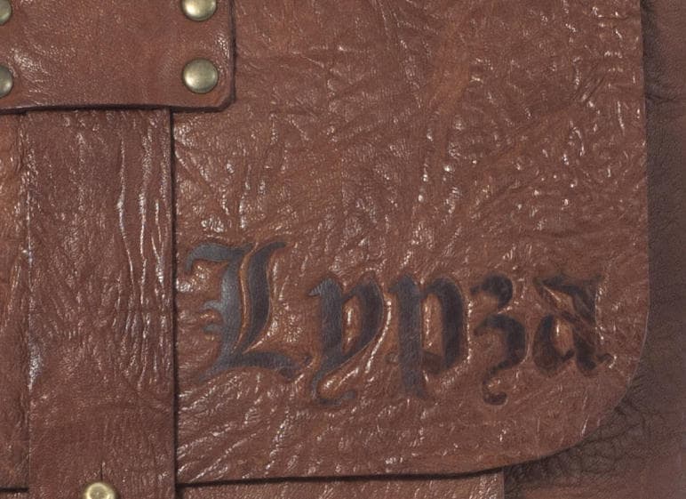 Relief in leather. Custom leather. Engraving letters or drawings