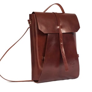 Multi-functional leather laptop bag: converts from backpack to shoulder bag & hand case