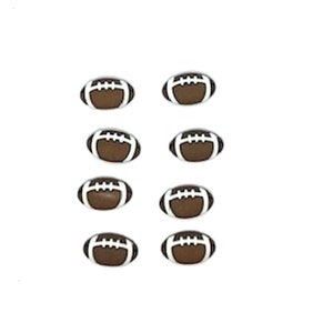 May include: Eight brown and white football-shaped embellishments.