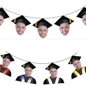 May include: A graduation banner featuring black graduation caps and faces of people wearing the caps. The banner is strung together with a black string. The faces are all smiling and have a variety of skin tones. The banner is ideal for a graduation party.
