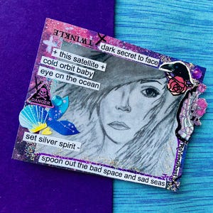 May include: A collage with a black and white drawing of a person's face, a black raven, a pink rose, a skull and crossbones, a seashell, and a blue and yellow mermaid tail. The collage has a purple and pink background with glitter and the text "dark secret to face", "+ this satellite +", "cold orbit baby", "eye on the ocean", "DANGER", "Raven Ghost", "set silver spirit -", and "spoon out the bad space and sad seas".