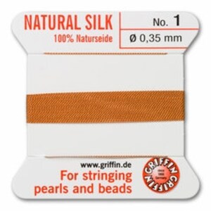 May include: A spool of natural silk thread, labeled "NATURAL SILK No. 1". The thread is a warm orange color, with a diameter of 0.35 mm. The label also includes the text "For stringing pearls and beads".