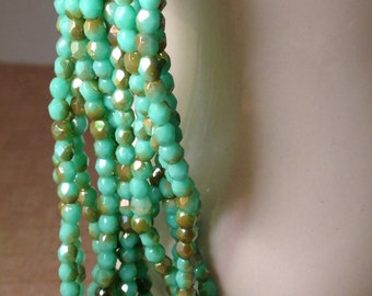 SHAMROCK GOLD 3mm Firepolish Green Turquoise Celsian Czech Glass Faceted Rounds - Qty 50 (3-035)
