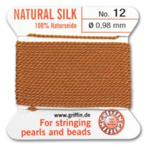 May include: A spool of natural silk thread, color is a warm brown. The label reads "NATURAL SILK" and "No. 12". The thread diameter is 0.98 mm. The label also states "For stringing pearls and beads".