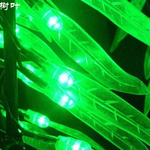 Puede incluir: Luces LED de hadas verdes con hojas de pl&aacute;stico transparente. Las luces est&aacute;n enhebradas en un cable y son perfectas para decorar una casa o un jard&iacute;n.