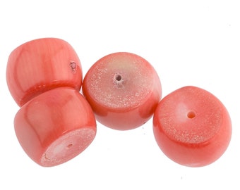Natural bamboo coral drum bead,  dyed.  Salmon color.  Sizes vary.  9x11mm to 12x12mm. 2 beads. b4-cor417-1