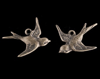 Oxidized brass bird 1 ring connector, 19mm. Sold in pairs, 1 facing left; the other, right. b9-0549-2