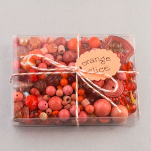 Vintage glass bead mix of orange color beads from Europe, Japan and beyond. .  5 oz box. b19-0112-Orange Slice
