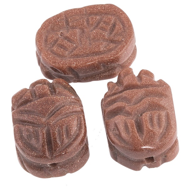 Carved Goldstone scarab beads, 18x13mm. package of 2. b4-gol208